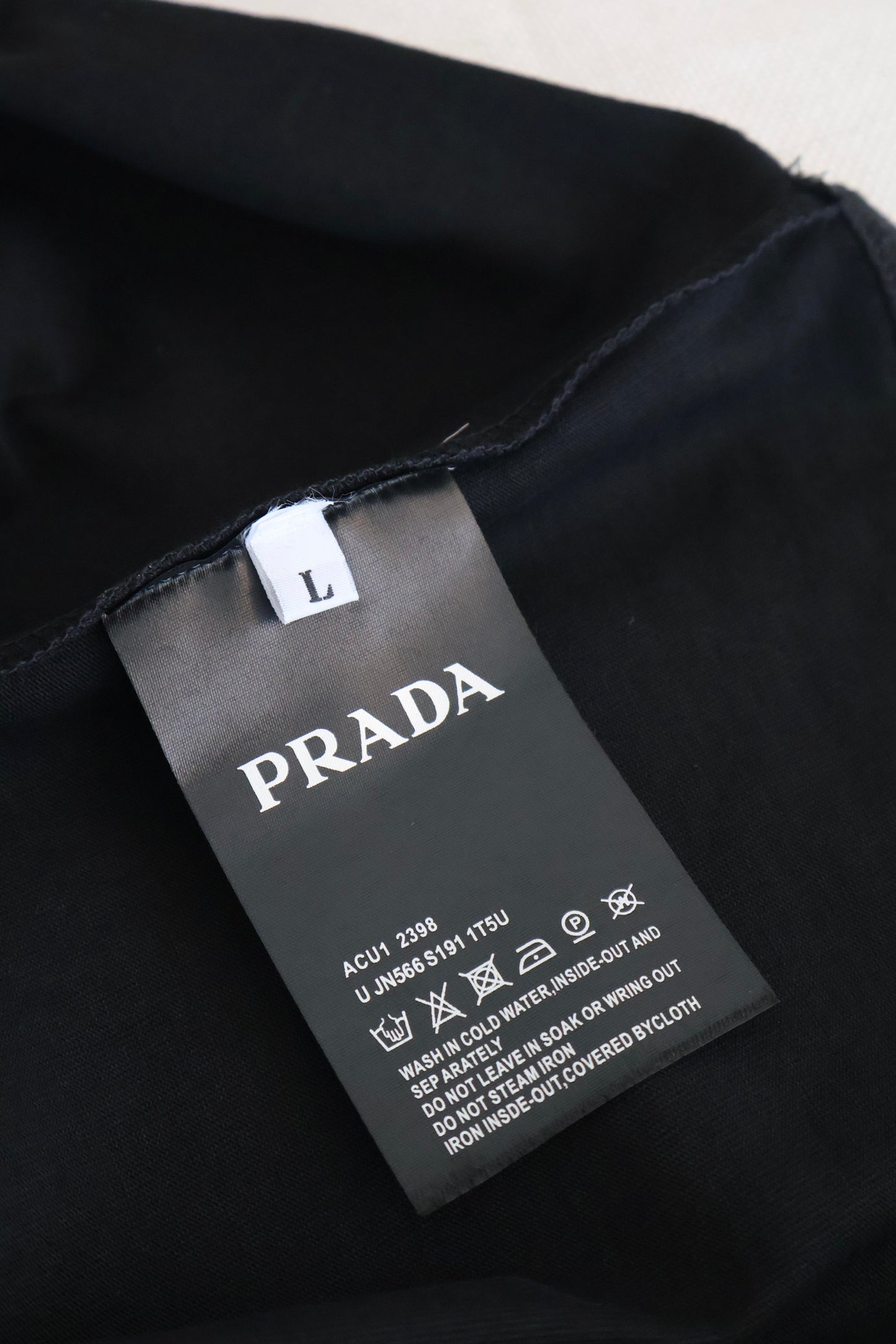 Prada Black Tee (Whatsapp for Price & Grade)